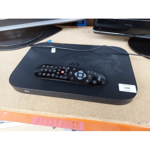 1104 - A Sky Q ES130 receiver box with remote