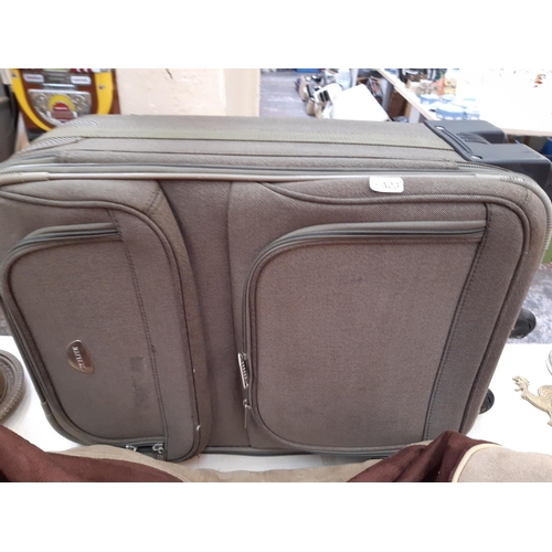 159 - A mixed collection of quality luggage and textile items to include fully lined Hopsack curtains meas... 