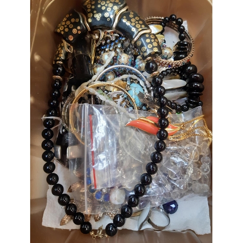 162 - A box of costume jewellery to include necklaces, brooches, cufflinks, boxed folding hand fan, Church... 