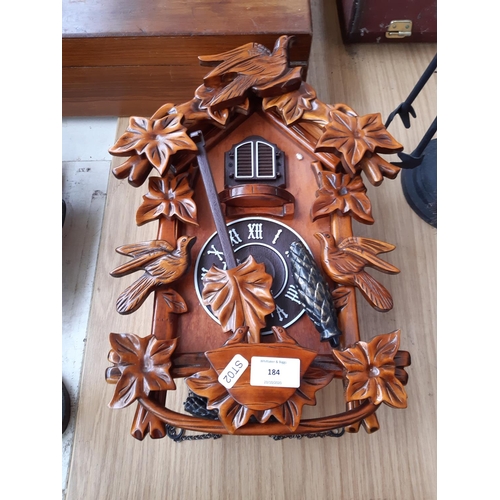 184 - A vintage style teak effect battery powered cuckoo clock