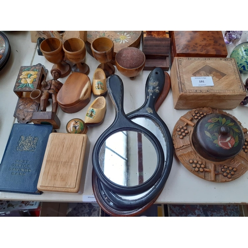 191 - A large collection of treen to include tri footed souvenir pin cushion with Colchester High Street s... 