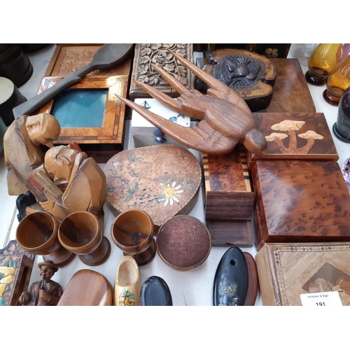 191 - A large collection of treen to include tri footed souvenir pin cushion with Colchester High Street s... 