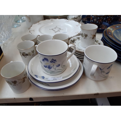 202 - A collection of Royal Doulton ceramics to include a set of seven Melrose pattern dinner plates, five... 