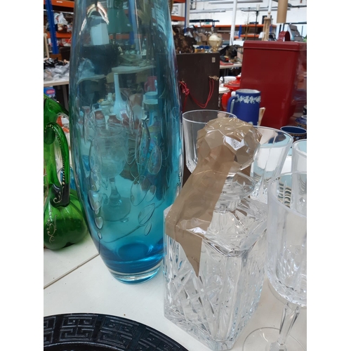 203 - A collection of good quality glassware to include a large modern blue glass floor standing vase, 33c... 