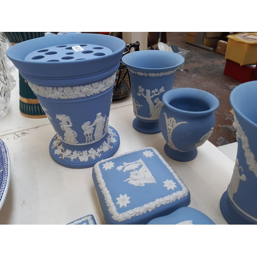 209 - Ten pieces of Wedgwood pale blue Jasperware together with six Lilliput Lane cottage ornaments and th... 