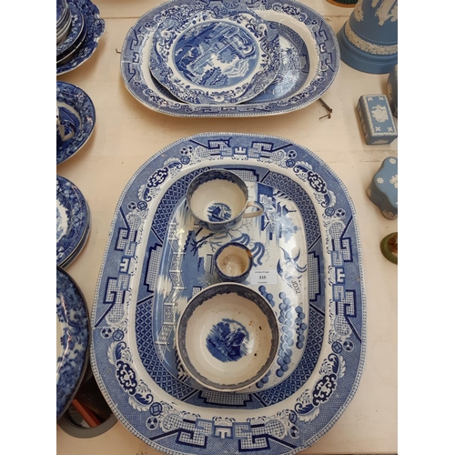 210 - A collection of vintage and antique bluer and white ceramics to include a nineteenth century English... 