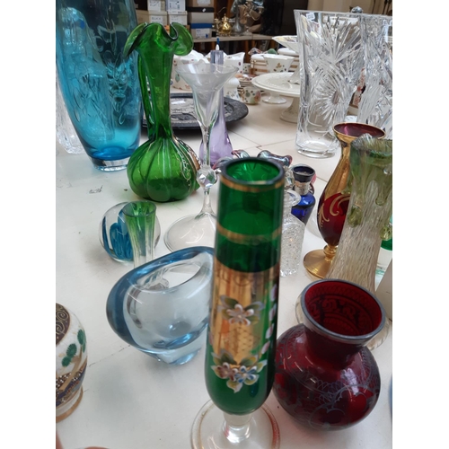 212 - A collection of mixed glassware to include a hand blown Venetian glass snake, Murano style glass bow... 