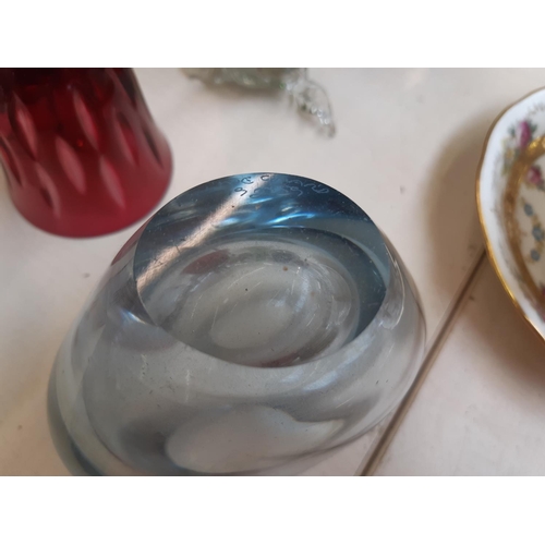 212 - A collection of mixed glassware to include a hand blown Venetian glass snake, Murano style glass bow... 