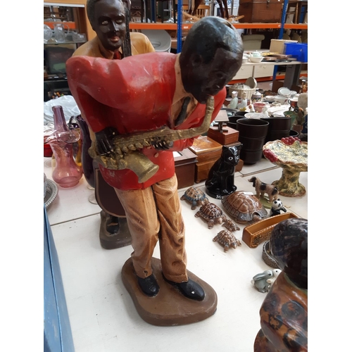 222 - Four vintage Jazz musician figurines to include two fibreglass examples - measuring approx. 56cm hig... 