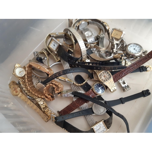 227 - A box containing a collection of various watches to include boxed Swatch watch, Swatch advertising f... 