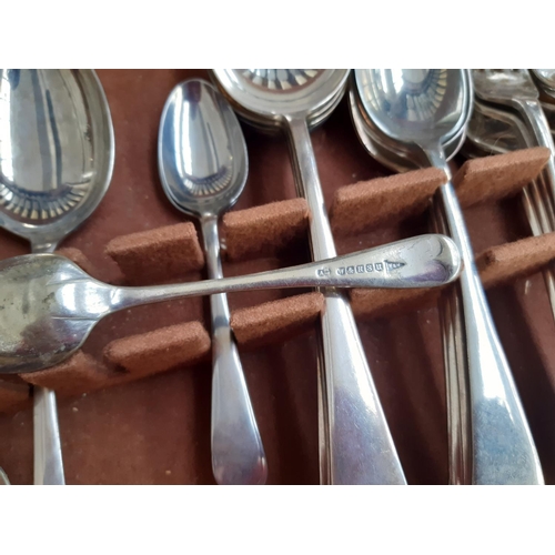 228 - A vintage oak cased part canteen of cutlery