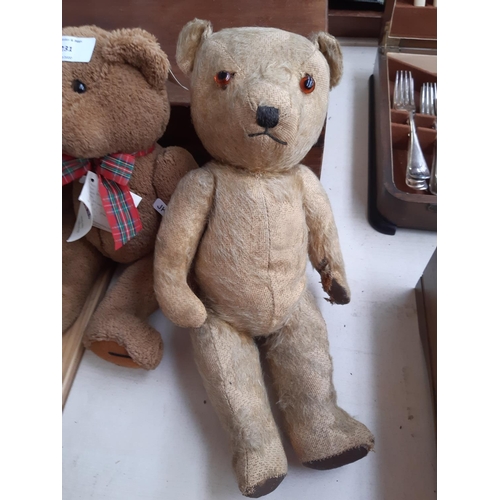 231 - Four vintage and modern Teddy Bears to include a 1950's straw filled articulated bear with leather p... 