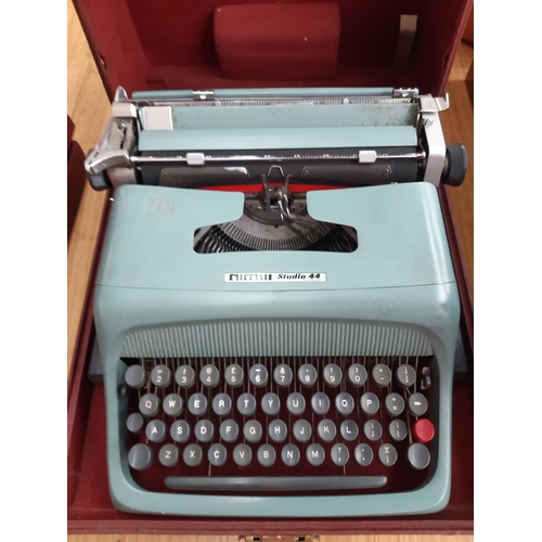 232 - A brown cased Olivetti studio 44 typewriter