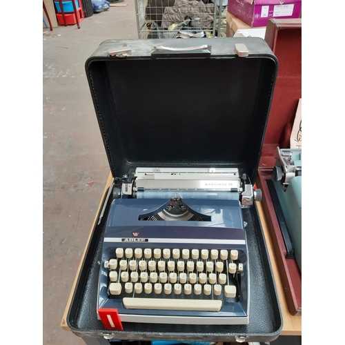 234 - A vintage black cased Adler Gabriele 35 typewriter