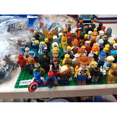 258 - An extensive collection of Lego (mostly figurines) to include R2D2, Woody, Batman, The Joker, Jack S... 