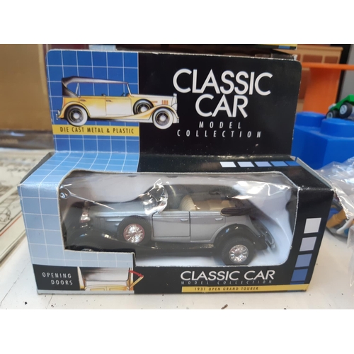 259 - A collection of seven boxed classic car die cast vehicles together with a Dinky super toys foden tan... 