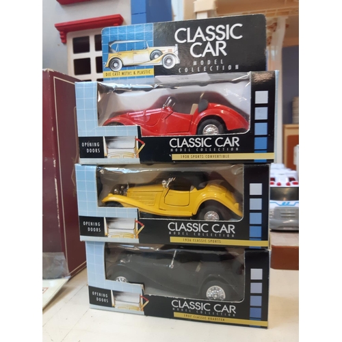 259 - A collection of seven boxed classic car die cast vehicles together with a Dinky super toys foden tan... 