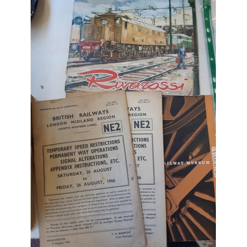 262 - A collection of railway memorabilia to include LMS locomotive book, British bus fleets book, magazin... 