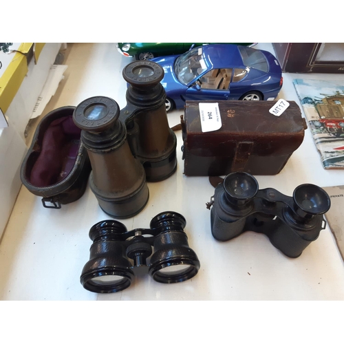 264 - Three vintage binoculars to include jumelle marine and two others