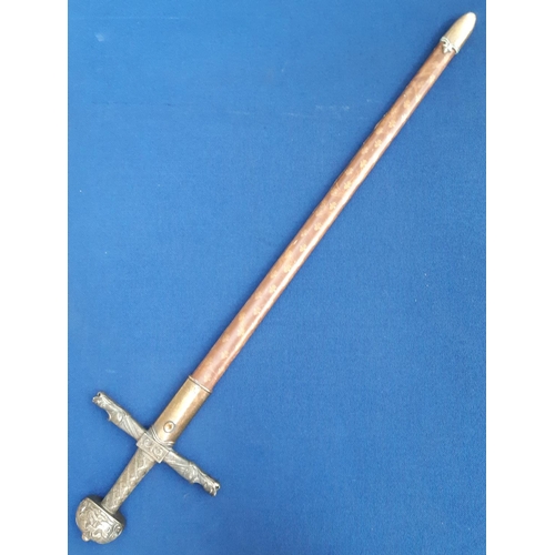 338A - A decorative Sword in brown leather scabbard