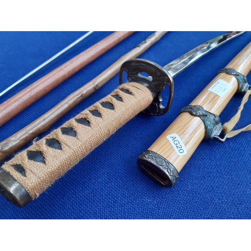 338B - Four items to include a decorative Japanese samurai sword, fencing rapier and two walking sticks