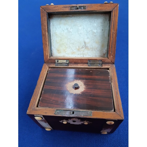 350 - A 19th century French oak tea caddy in the form of a treasure chest with ivory button decoration