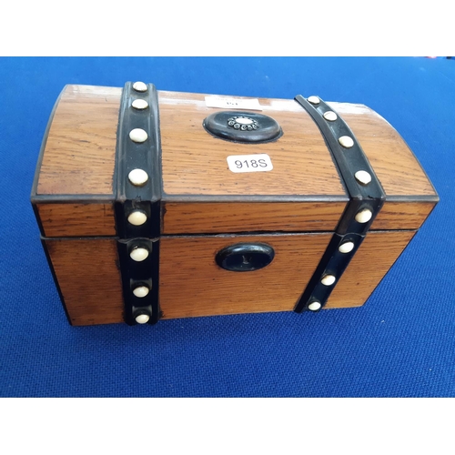 351 - A 19th century French oak two section tea caddy in the form of a treasure chest with ivory button in... 