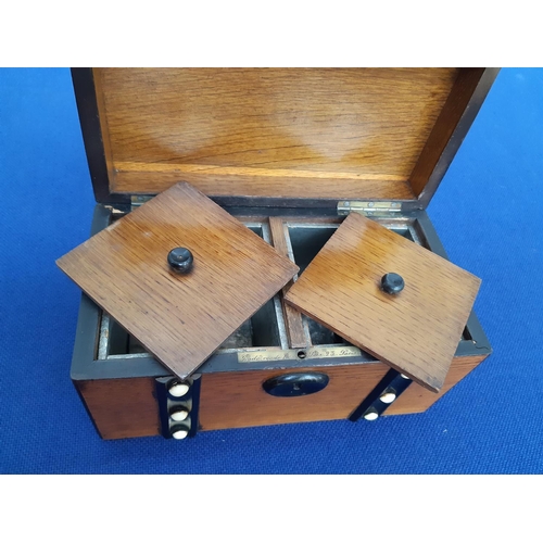 351 - A 19th century French oak two section tea caddy in the form of a treasure chest with ivory button in... 