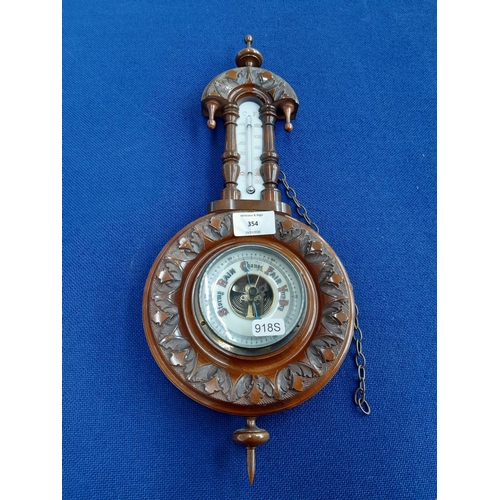 354 - An early 20th century mahogany aneroid barometer