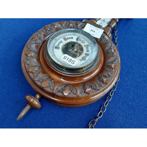 354 - An early 20th century mahogany aneroid barometer