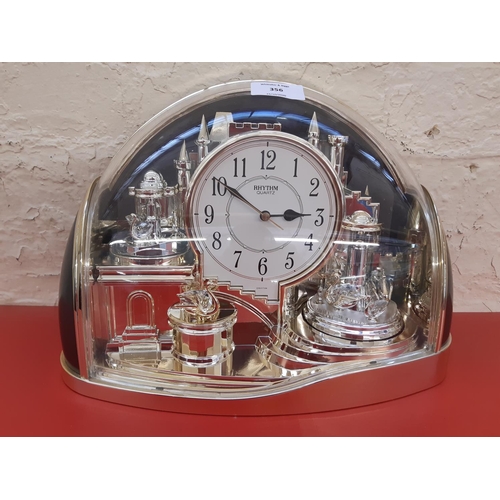 356 - A vintage Rhythm quartz mantel clock