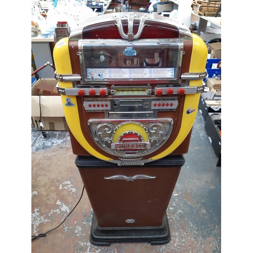 359 - A modern jukebox style radio / CD player - measuring approx. 100cm in height