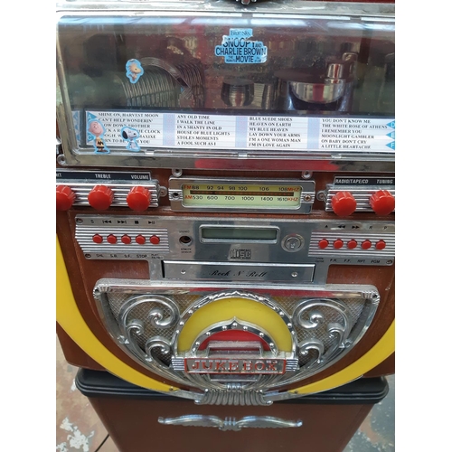 359 - A modern jukebox style radio / CD player - measuring approx. 100cm in height