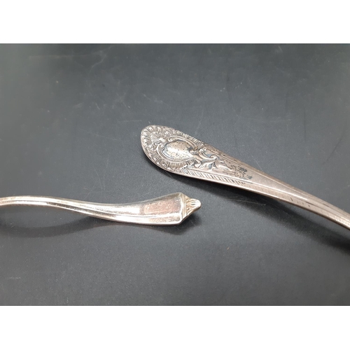 13 - Two pieces of hallmarked Sheffield silver to include a tea strainer, dated 1937 and a small serving ... 