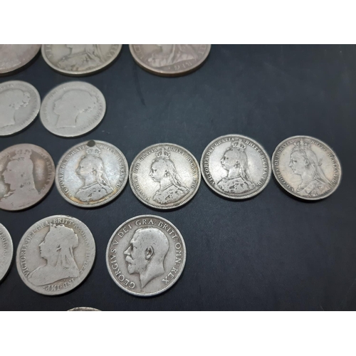 35 - A collection of British pre 1920 92.5% silver coins to include three half crowns, one florin, thirte... 