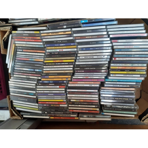 363 - Four boxes containing various CDs and a Laurel & Hardy complete collection DVD box set