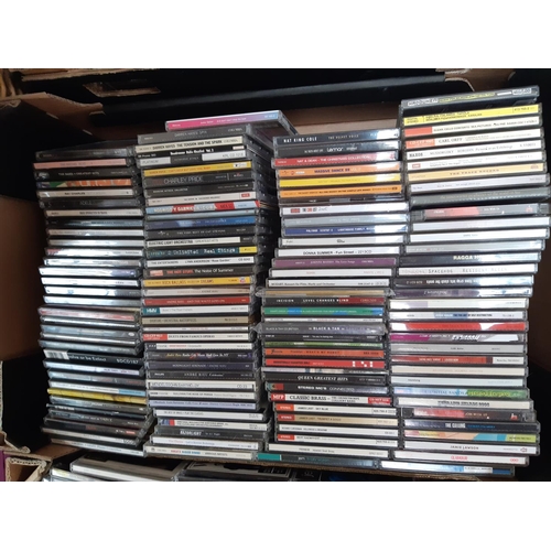 363 - Four boxes containing various CDs and a Laurel & Hardy complete collection DVD box set