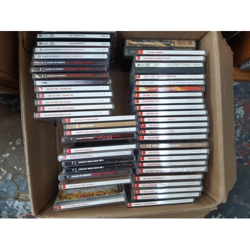 364 - Three boxes and Three CD racks containing a large quantity of CDs and DVDs to include Band of Brothe... 