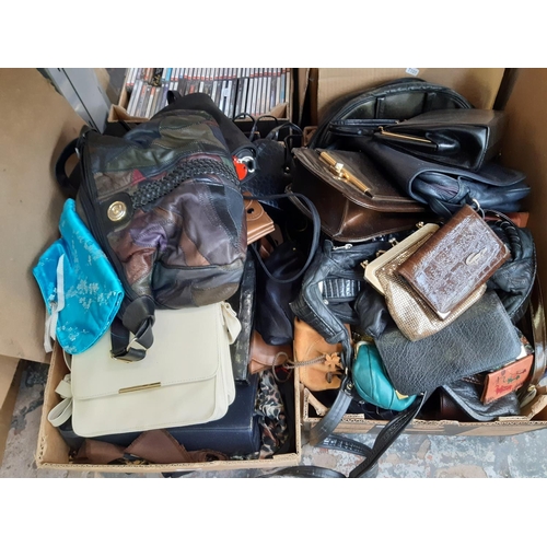 370 - Two boxes containing a large quantity of vintage ladies handbags and purses