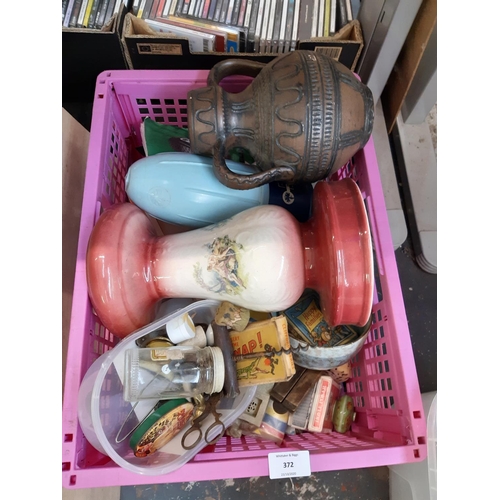 372 - Four boxes containing mixed items to include metalware, Portmeirion part coffee set, tins, posters e... 