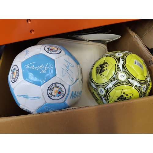 386 - Four boxes containing mixed items to include wall clock, Manchester City F.C football, large quantit... 