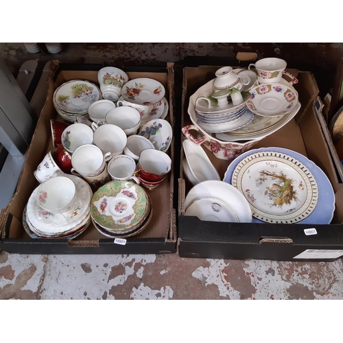 401 - Nine boxes containing mixed items to include various ceramics, glassware, brassware, mottled glass f... 