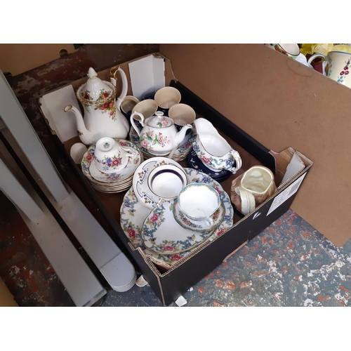 401 - Nine boxes containing mixed items to include various ceramics, glassware, brassware, mottled glass f... 