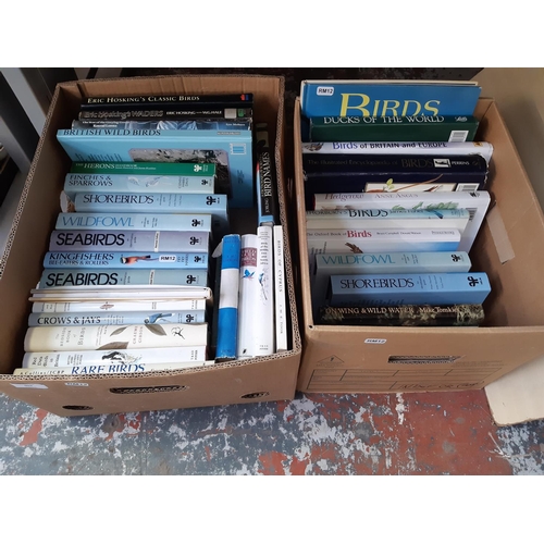 403 - Two boxes containing a large quantity of bird watching related books