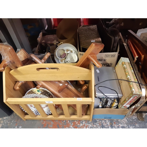 413 - Three boxes containing mixed items to include ceramics, embossed brass magazine rack, brown leather ... 