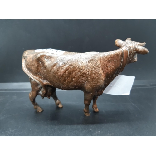 42 - A well detailed 19th century cast bronze sculpture of a cow with Victorian kite mark