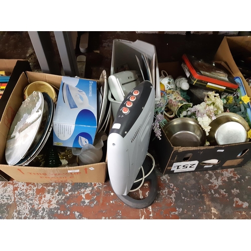 426 - Five boxes containing mixed items to include mottled glass handled basket, embossed brass magazine r... 