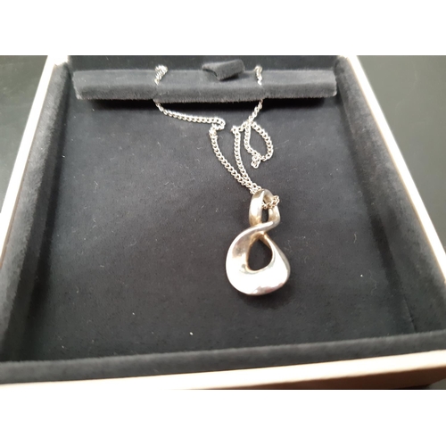 66 - Three boxed Georg Jensen 925 silver items to include necklace with pendant and two pairs of earrings... 