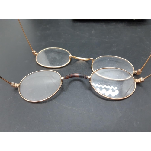 69 - Two pairs of 19th century Pince-Nez spectacles in black case