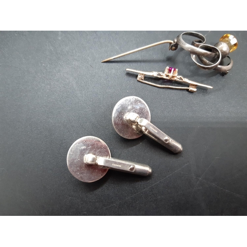 75 - Three items to include a pair of hallmarked 925 silver gents cufflinks, hallmarked Chester silver br... 